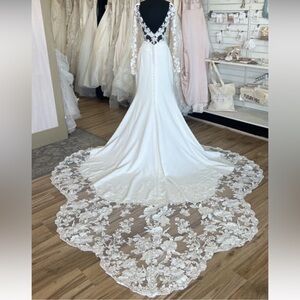 Wedding dress. Never worn by me. Purchased at a consignment bridal shop.